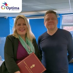 Mims Davies, carrying a red file, is pictured on the left with Oliver Wright from Optima UK.